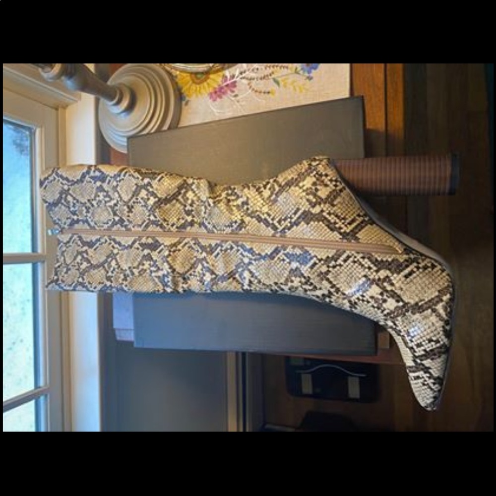 Knee high snakeskin boots